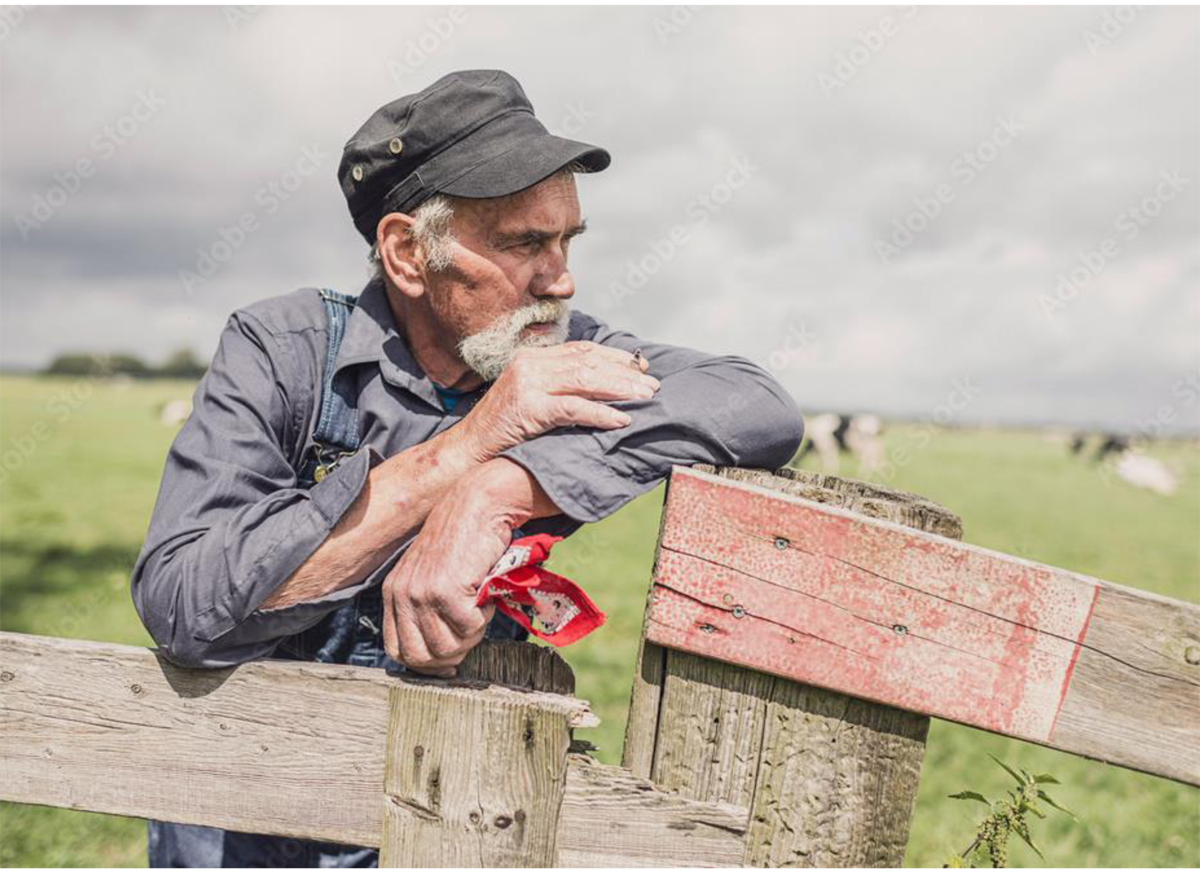 Figure&nbsp;5 &ndash; Farmer looking out into the distance.