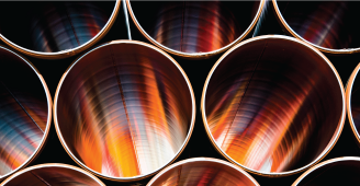 Stack of empty copper pipes.