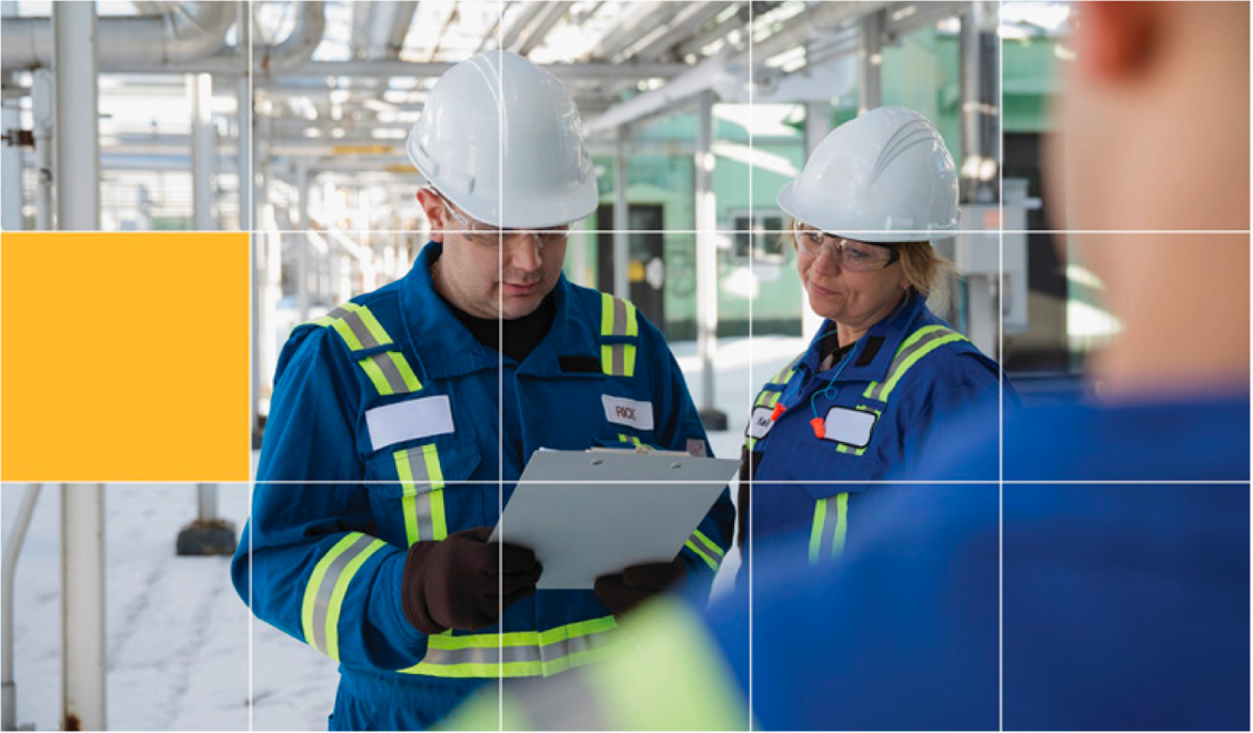 Three CER inspectors in PPE inspect a facility
