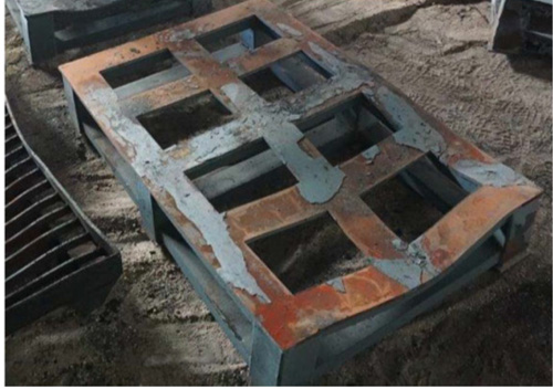 Figure 6 &ndash; Steel pallet used to support welded elbows in the furnace